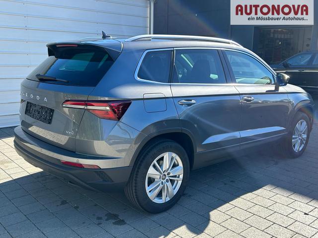 Skoda Karoq Extra Plus 2.0 TDI DSG 4x4 AHK*Android Auto*Matrix*E-Heck*SHZ*ACC*Keyless*Kamera*17" LM* 2Z Klimaauto*SUNSET 