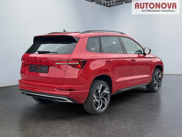 Skoda Karoq Sportline 1,5 TSI DSG 2ZKlimaautomatik Canton Anh&auml;ngerkupplung Totewinkel Assistent 2 x Einparkhilfe Kamera 19 Zoll Felgen adaptiver Tempomat 5J Garantie 