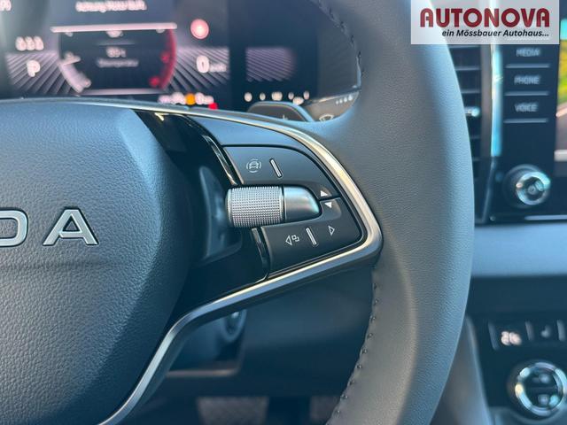 Skoda Karoq Extra Plus 1,5 TSI DSG 2Zoklima 2xEinparkhilfe AHK Kamera Sitzheizung beheiztes Lenkrad 