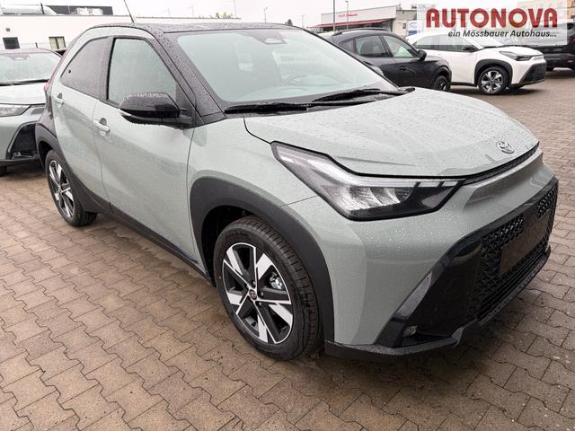 Toyota Aygo X Pulse 1.5 Hybrid 115PS CVT/AUTOMATIK, 3 Jahre Garantie, 17" Alufelgen, Uni-Lackierung Tarragon /Dach schwarz, Privacy-Glas, Sitzheizung, R&uuml;ckfahrkamera, Klimaautomatik, Audiosystem 9" + Smartphone-Integration, Lederlenkrad, ACC, ZV mit Fernbedienung 