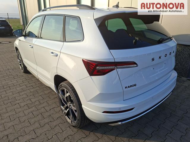 Skoda Karoq Sportline 1.5 TSI 150PS DSG, WEISS-MET, 5JGARANTIE, AHK SCHWENKBAR, 19" ALU SAGITARIUS, BEHEIZTE FRONTSCHEIBE, SITZHEIZUNG, MATRIX-LED, Elektr. Heckklappe, Virtual Cockpit 10", Climatronic, NAVI, ACC, Parksensoren v/h, R&uuml;ckfahrkamera, Dachreling, PRIVACY-GLAS 