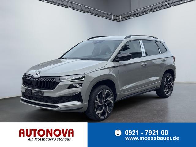 Skoda Karoq - Sportline 1,5 TSI DSG 2ZKlimaautomatik Canton Anh&auml;ngerkupplung Totewinkel Assistent 2 x Einparkhilfe Kamera 19 Zoll Felgen adaptiver Tempomat 5J Garantie