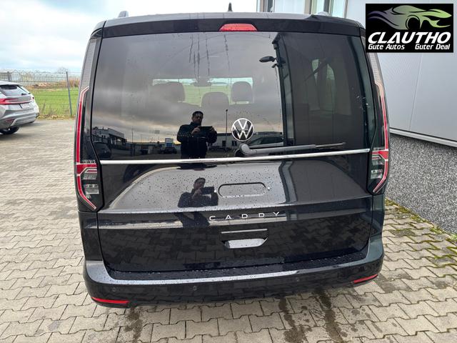 Volkswagen Caddy Style MAXI 7-SITZER 1.5 TSI 115PS DSG/AUTOMATIK, Deep-Black, 17" Alu/Ganzjahresreifen, Winterpaket, ACC-Tempomat, Toter-Winkel, ParkAssist, Parksensoren vo/hi, Rückfahrkamera, Radio Ready2Discover 10" + Wireless AppConnect, Climatronic, Abgedunkelte Scheiben 