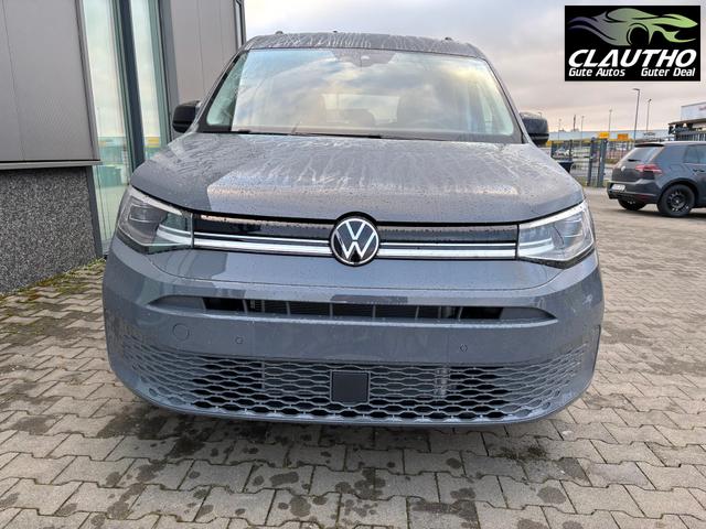 Volkswagen Caddy Style MAXI 7-SITZER 1.5 TSI 115PS DSG/AUTOMATIK, PURE-GREY, 17" Alu/Ganzjahresreifen, Winterpaket, ACC-Tempomat, Toter-Winkel, ParkAssist, Parksensoren vo/hi, Rückfahrkamera, Radio Ready2Discover 10" + Wireless AppConnect, Climatronic, Abgedunkelte Scheiben 