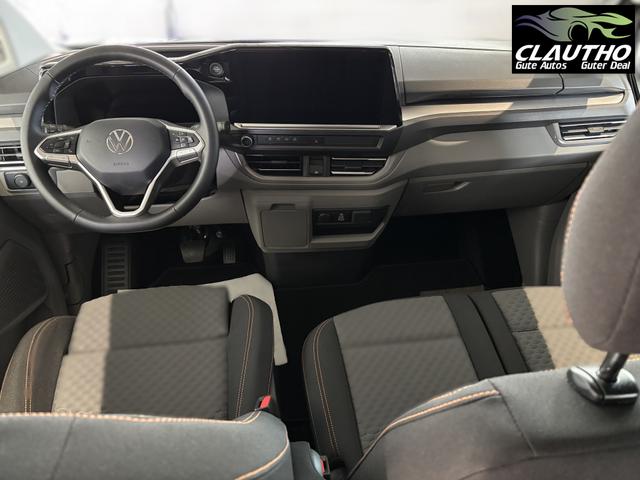 Volkswagen T7 Caravelle PanAmericana 2.0 TDI 110PS LANGER RADSTAND, 8-Sitzer, 17" Alu, NAVIGATION 13", Sitzheizung, M-Lederlenkrad, LED-Scheinwerfer, 3-Zonen-Climatronic, Parksensoren vorn/hinten, Rückfahrkamera, Privacy-Glas, Tempomat, Digitales Cockpit 
