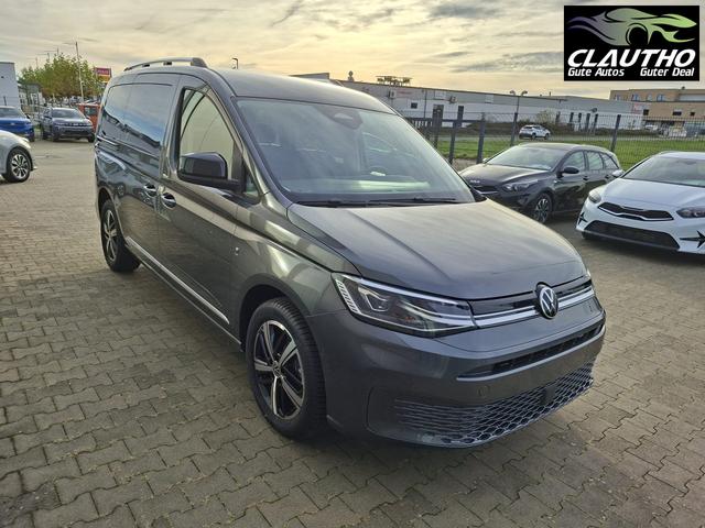 Volkswagen Caddy Style MAXI 7-SITZER 1.5 TSI 115PS DSG/AUTOMATIK, INDIUM-GRAU, 17" Alu/Ganzjahresreifen, Winterpaket, ACC-Tempomat, Toter-Winkel, ParkAssist, Parksensoren vo/hi, Rückfahrkamera, Radio Ready2Discover 10" + Wireless AppConnect, Climatronic, Abgedunkelte Scheiben 