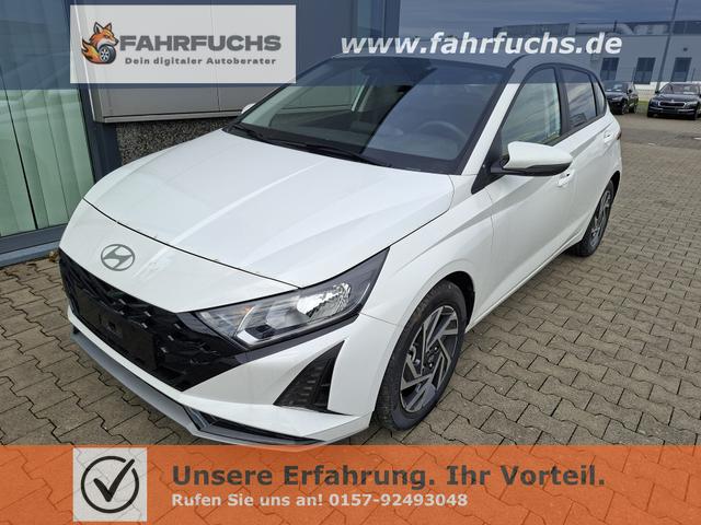 Hyundai i20 - Family 1.0 T-GDI 90PS, NAVI 10,25", Sonderfarbe ATLAS-WHITE, Winter-Pack: Sitzheizung + Lenkradheizung, 16" ALU, Klimaautomatik, Privacy-Glas, Parksensoren hinten, R&uuml;ckfahrkamera, Tempomat, Lederlenkrad, Reserverad, Alarm, Armlehne, 4x elektr. Fensterheber
