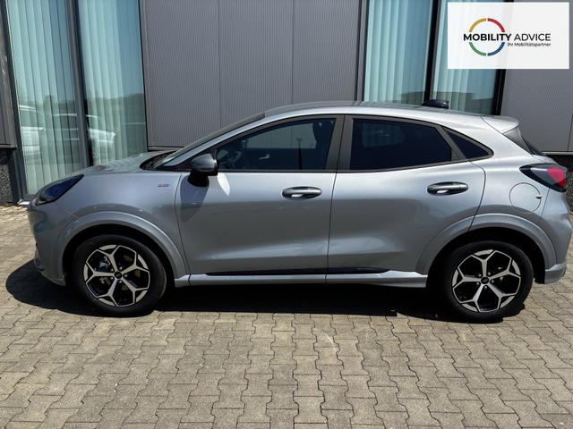 Ford Puma ST-Line 1.0 EcoBoost 125PS AUTOMATIK, SOLAR-SILVER Metallic, Elektr. Heckklappe, Key-Frey-System, Spiegel anklappbar, Induktives Laden, 17" Alu, NAVIGATION, Klimaautomatik, Privacy-Glas, Parksensoren hinten, R&uuml;ckfahrkamera, Tempomat, Sportfahrwerk 