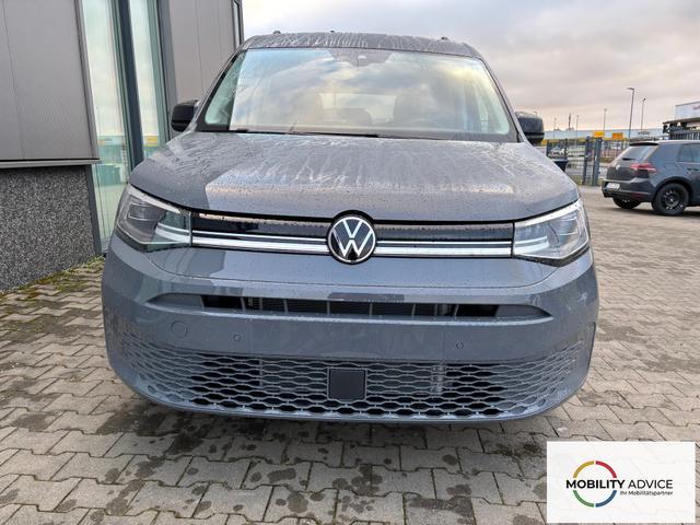 Volkswagen Caddy Maxi Style 7-SITZER 1.5 TSI 115PS DSG/AUTOMATIK, PURE-GREY, 17" Alu/Ganzjahresreifen, Winterpaket, ACC-Tempomat, Toter-Winkel, ParkAssist, Parksensoren vo/hi, R&uuml;ckfahrkamera, Radio Ready2Discover 10" + Wireless AppConnect, Climatronic, Abgedunkelte Scheiben 