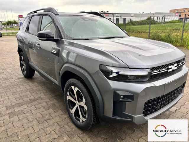 Dacia Bigster Journey FULL-HYBRID 155 (Benzin+Elektro), GRAU-METALLIC/DACH SCHWARZ, BEHEIZTE FRONTSCHEIBE, SITZHEIZUNG, LENRADKRADHEIZUNG, TOTER-WINKEL-ASSISTENT, PARKSENSOREN VORN/HINTEN, MULTIVIEW-KAMERA, 18" ALUFELGEN, PRIVACY-GLAS, NAVIGATION, ELEKTR. HECKKLAPPE, ACC 