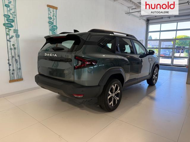 Dacia Bigster Zeder Gruen