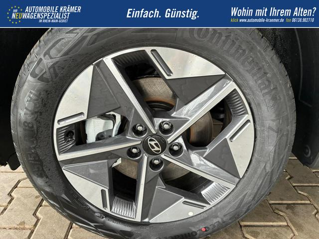 Hyundai TUCSON E-Motion 1.6 T-GDi 2WD HEV / Panoramadach ACC LED Sitz + Lenkradheizung Navi PDC V&H Kamera Alu 18" 