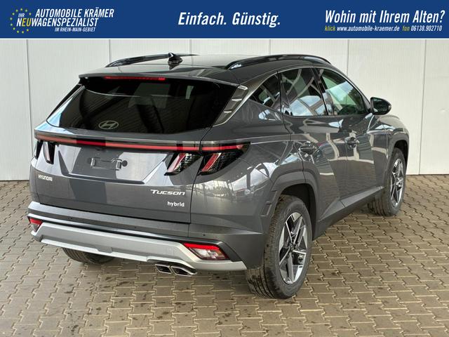 Hyundai TUCSON E-Motion 1.6 T-GDi 2WD HEV / Panoramadach ACC LED Sitz + Lenkradheizung Navi PDC V&H Kamera Alu 18" 