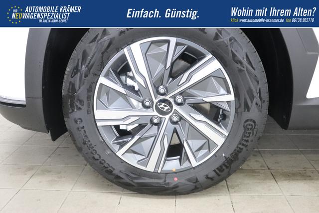 Hyundai Tucson 1.6 T-GDI 6MT 2WD Family MY23 110kW Polar White Sitzpolsterung in Stoff Schwarz