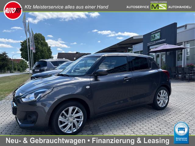 Gebrauchtfahrzeug Suzuki Swift - 1.2 Hybrid Dualjet SHVS Comfort AUTOMATIK-GETRIEBE ! TEMPOMAT ACC KLIMA KAMERA LED TOTE-WINKEL PDC SITZHEIZUNG NAVIGATION BLUETOOTH SPRACHSTEUERUNG ALU 16" EL.FENSTERHEBER... 1A ZUSTAND!