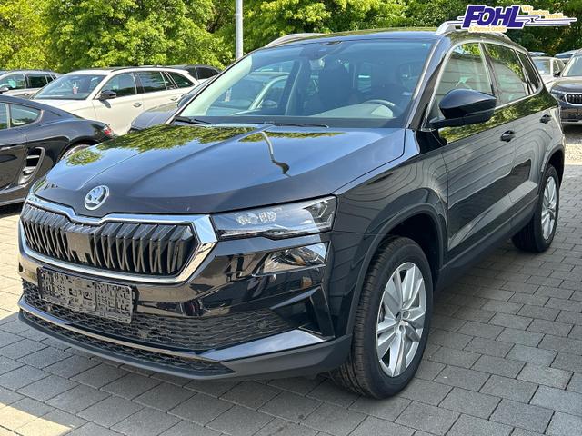 Skoda Karoq Extra Plus 2.0 TDI DSG AHK*Android Auto*Matrix*E-Heck*SHZ*ACC*Keyless*Kamera*17" LM* 2Z Klimaauto*SUNSET 