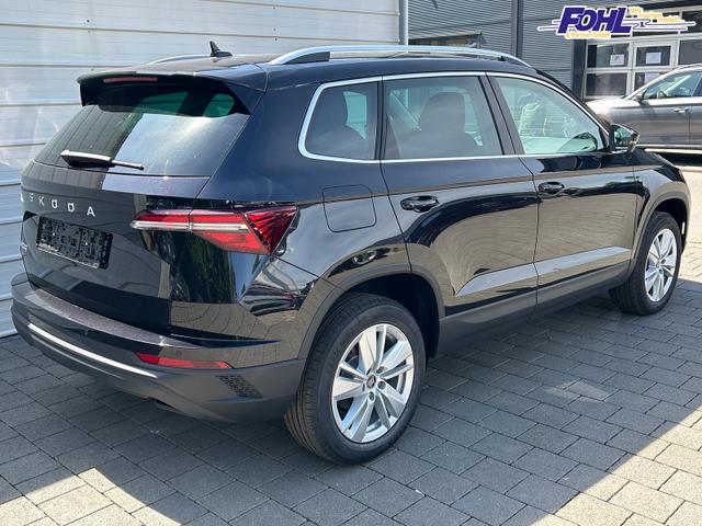 Skoda Karoq Extra Plus 2.0 TDI DSG AHK*Android Auto*Matrix*E-Heck*SHZ*ACC*Keyless*Kamera*17" LM* 2Z Klimaauto*SUNSET 