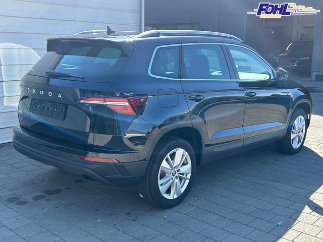 Skoda Karoq Extra Plus 2.0 TDI DSG AHK*Android Auto*Matrix*E-Heck*SHZ*ACC*Keyless*Kamera*17" LM* 2Z Klimaauto*SUNSET 