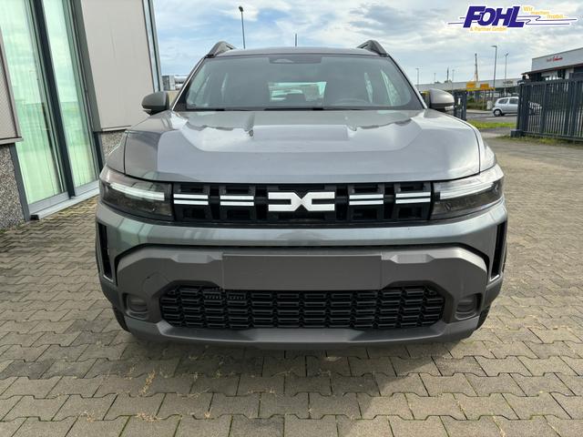Dacia Duster Extreme 1.8 HYBRID 155 (Benzin/Elektro) AUTOMATIK, 17" Alufelgen "TERGAN", Klimaautomatik, Hands-free, Rückfahrkamera, Parksensoren hinten, LED-Scheinwerfer, Radio 10" + Smartphone-Spiegelung, Abgedunkelte Scheiben, Nebelscheinwerfer, Armlehne, Dachreling, Tempo 