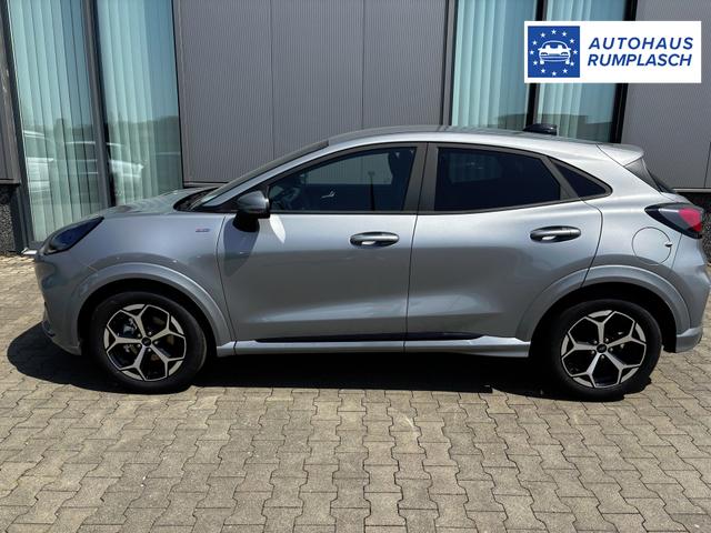 Ford Puma ST-Line 1.0 EcoBoost 125PS AUTOMATIK, SOLAR-SILVER Metallic, Elektr. Heckklappe, Key-Frey-System, Spiegel anklappbar, Induktives Laden, 17" Alu, NAVIGATION, Klimaautomatik, Privacy-Glas, Parksensoren hinten, Rückfahrkamera, Tempomat, Sportfahrwerk 
