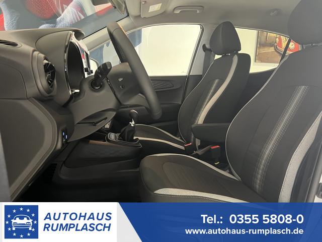 Hyundai i10 - GO+ 1.2 MT 58 kW (79 PS) Klimaautomatik, Navigationssystem, Apple CarPlay & Android Auto, Sitzheizung, Lenkradheizung, Einparkhilfe hinten, Rückfahrkamera, Privacy Glass, 15" Leichtmetallfelgen, uvm.